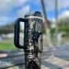 Black and white Frida Kahlo inspired travel mug with floral design.